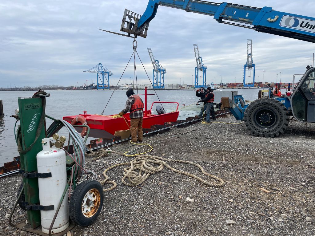 SubCon safety and rescue vessel being deployed at a commercial port for marine construction operations